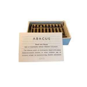 Vintage Abacus Chinese Calculator on green Marble